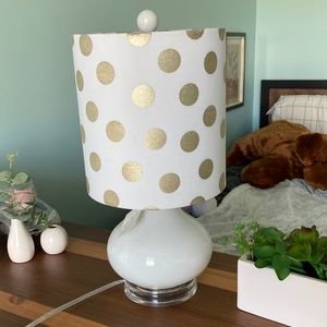 Porcelain lamp with white and gold cylindrical lamp shade